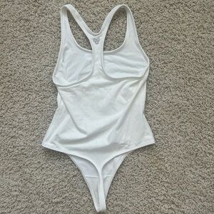 TNA by aritzia bodysuit in white *never worn*